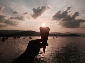 Scenic view of sea at sunset