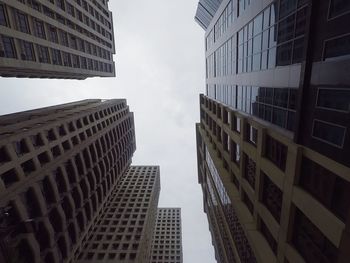 Low angle view of skyscrapers against sky