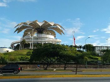 View of built structure against blue sky and clouds