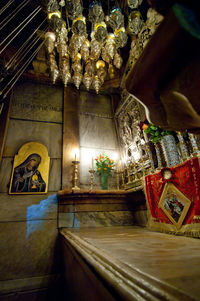 Low angle view of illuminated statue at temple