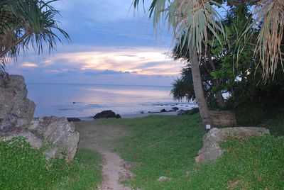 Scenic view of sea against cloudy sky