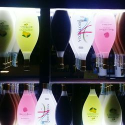 Close-up of bottles on display at store