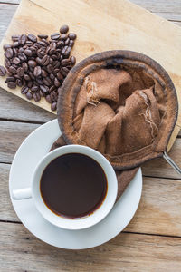 High angle view of coffee cup on table