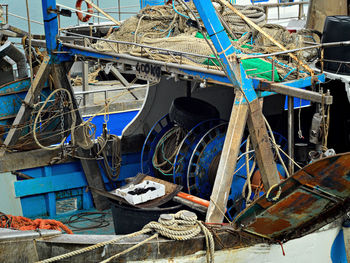 View of fishing boats moored in water