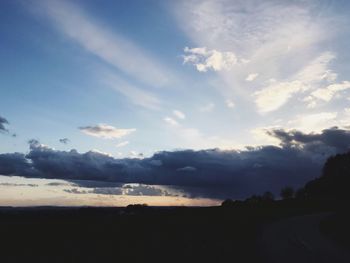 Scenic view of beach against sky during sunset