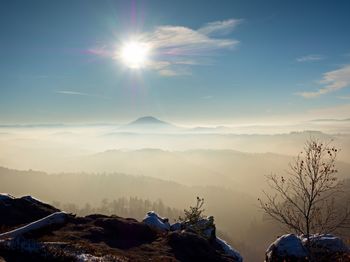 Scenic view of mountains against sky during sunset