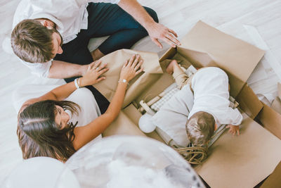 High angle view of people relaxing on floor