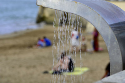 Close-up of water splashing on wood