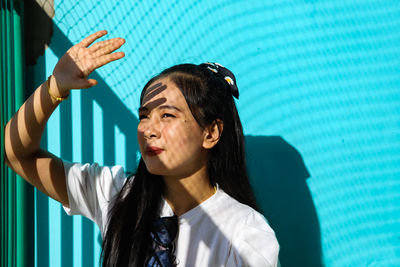 Portrait of a teenage women looking away