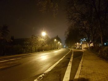 Illuminated street at night