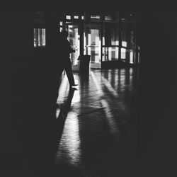 Man in corridor of building