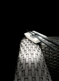 Close-up of electric lamp against black background