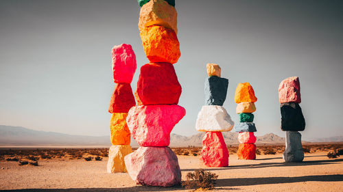 Panoramic view of rock formations in desert against sky