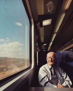 Man sitting in train