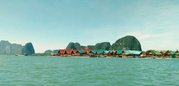 Scenic view of bay against clear sky