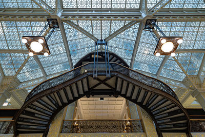 Low angle view of illuminated ceiling of building