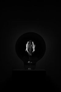 Low angle view of illuminated light bulb