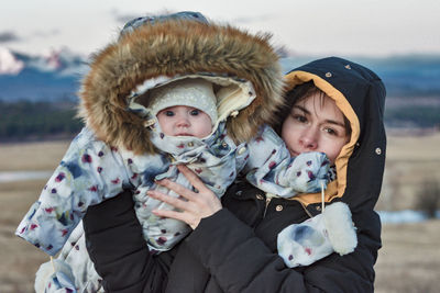 Portrait of daughter and mother