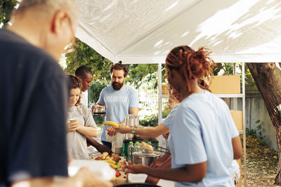 Portrait of young woman holding bouquet