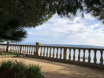 Bridge over sea against sky