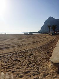 Scenic view of beach against clear sky