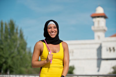 Portrait of a smiling young woman