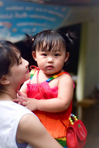 Mother and daughter at home