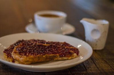 Close-up of coffee cup on table