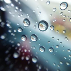 Close-up of water drops on glass