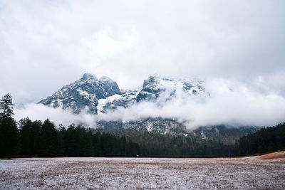 Scenic view of snowcapped mountains against sky