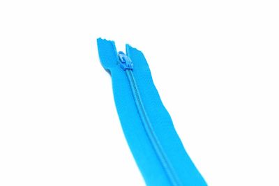 Close-up of blue white background