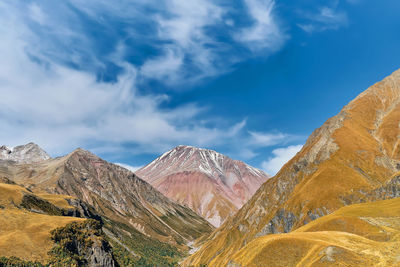 Early autumn in the mountains, view of the caucasus mountains from the valley of the devil. 