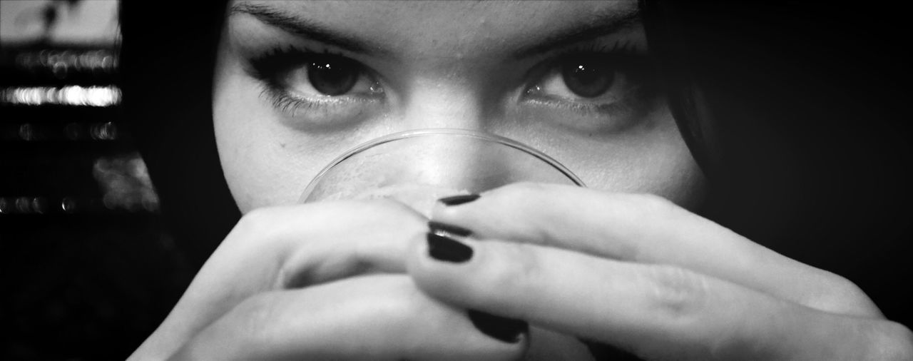 young adult, close-up, headshot, indoors, lifestyles, human face, portrait, looking at camera, person, front view, young women, serious, contemplation, focus on foreground, leisure activity