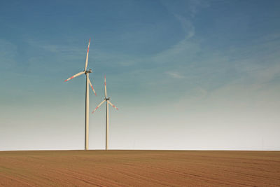Low angle view of windmill