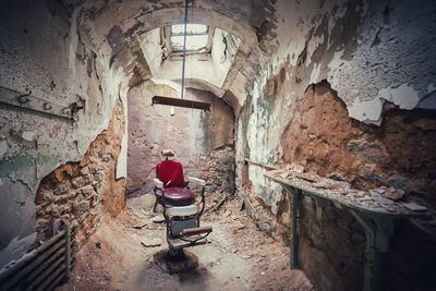 Old barber chair in abandoned building