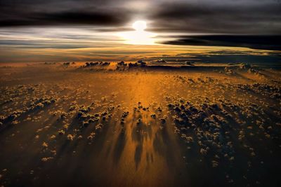 Scenic view of landscape against sky during sunset