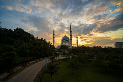 Panoramic view of buildings against sky during sunset