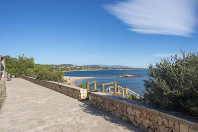 Scenic view of sea against blue sky