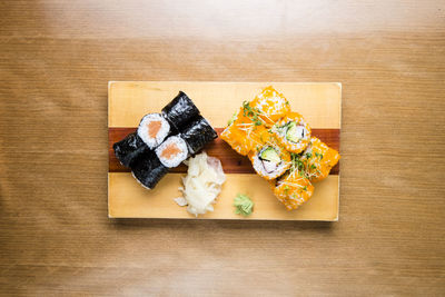 High angle view of sushi served on table