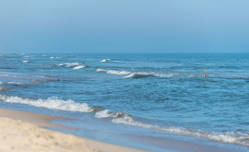 Scenic view of sea against clear sky