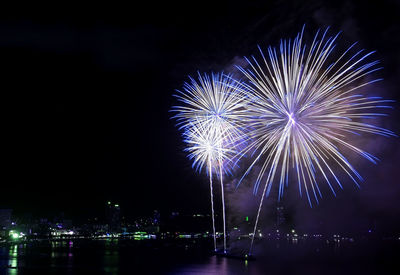 Firework display at night
