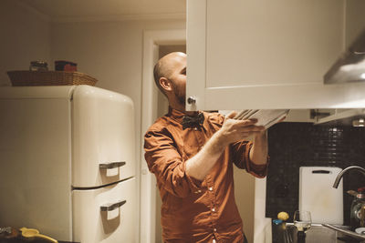 Man in kitchen