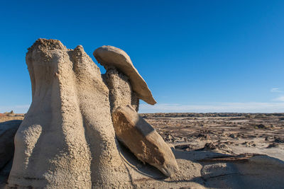 View of rock formation in desert against sky