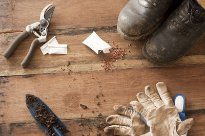 High angle view of gardening equipment on table