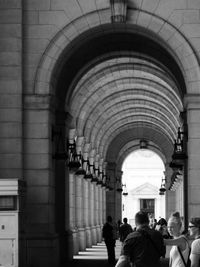 Silhouette of woman in shopping mall