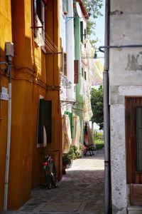 Street amidst residential buildings