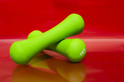 Close-up of green chili peppers on table
