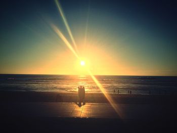 Scenic view of sea at sunset