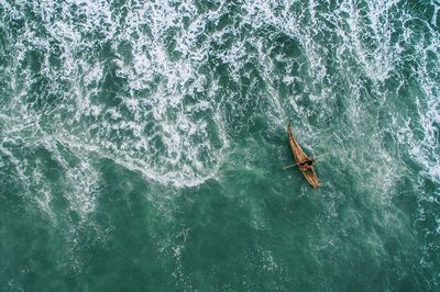 High angle view of person on boat in sea