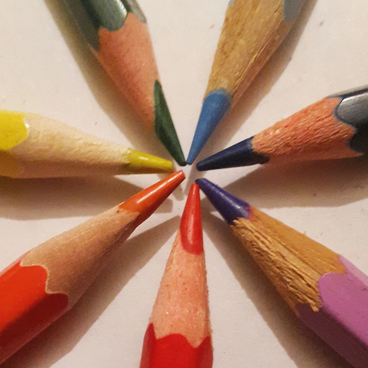 indoors, still life, art and craft, close-up, creativity, multi colored, art, pencil, paper, wood - material, table, colored pencil, variation, ideas, studio shot, no people, white background, high angle view, large group of objects, colorful